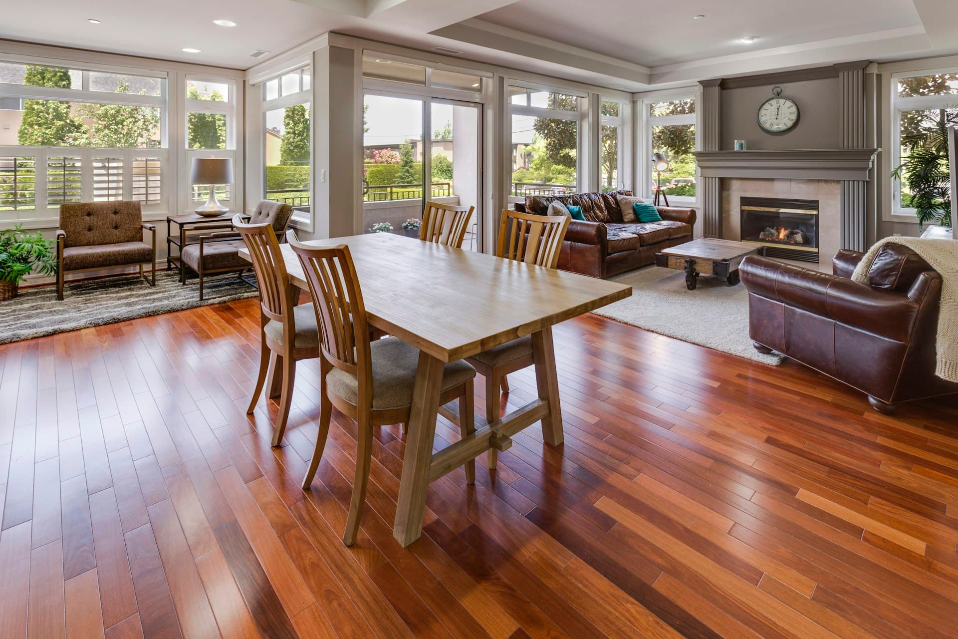 Freshly polished timber floor in a bright, modern open-plan living and dining space